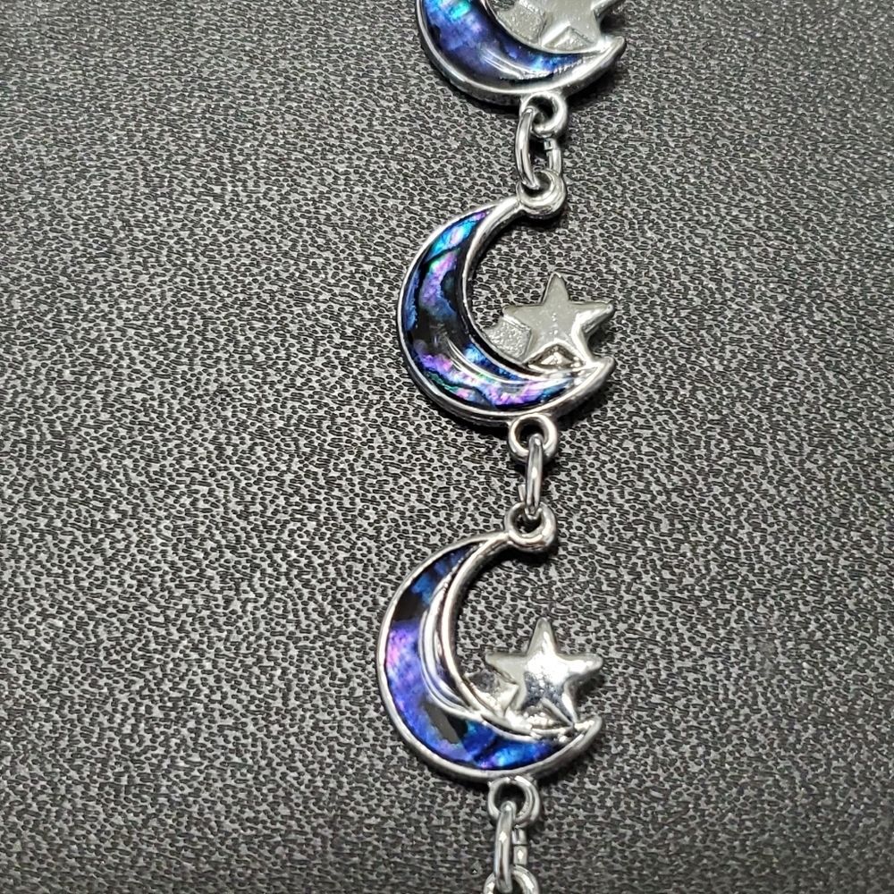 Silver tone star and moon bracelet 7.25"